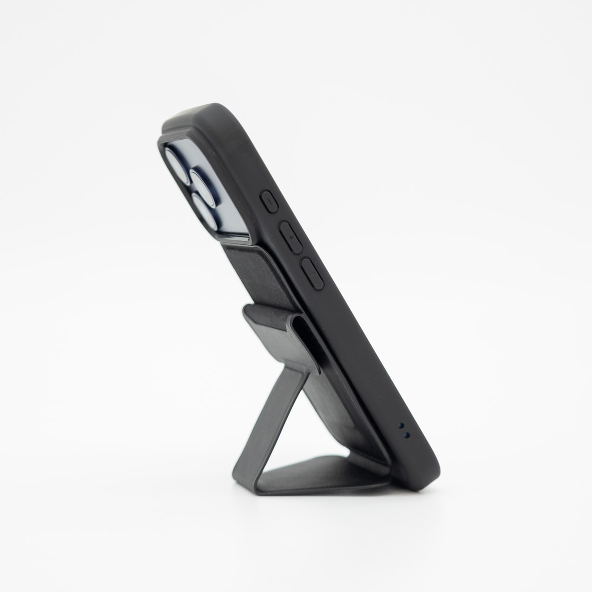 Side profile of the Peel Magnetic Wallet Stand with the stand folded out to support an iPhone